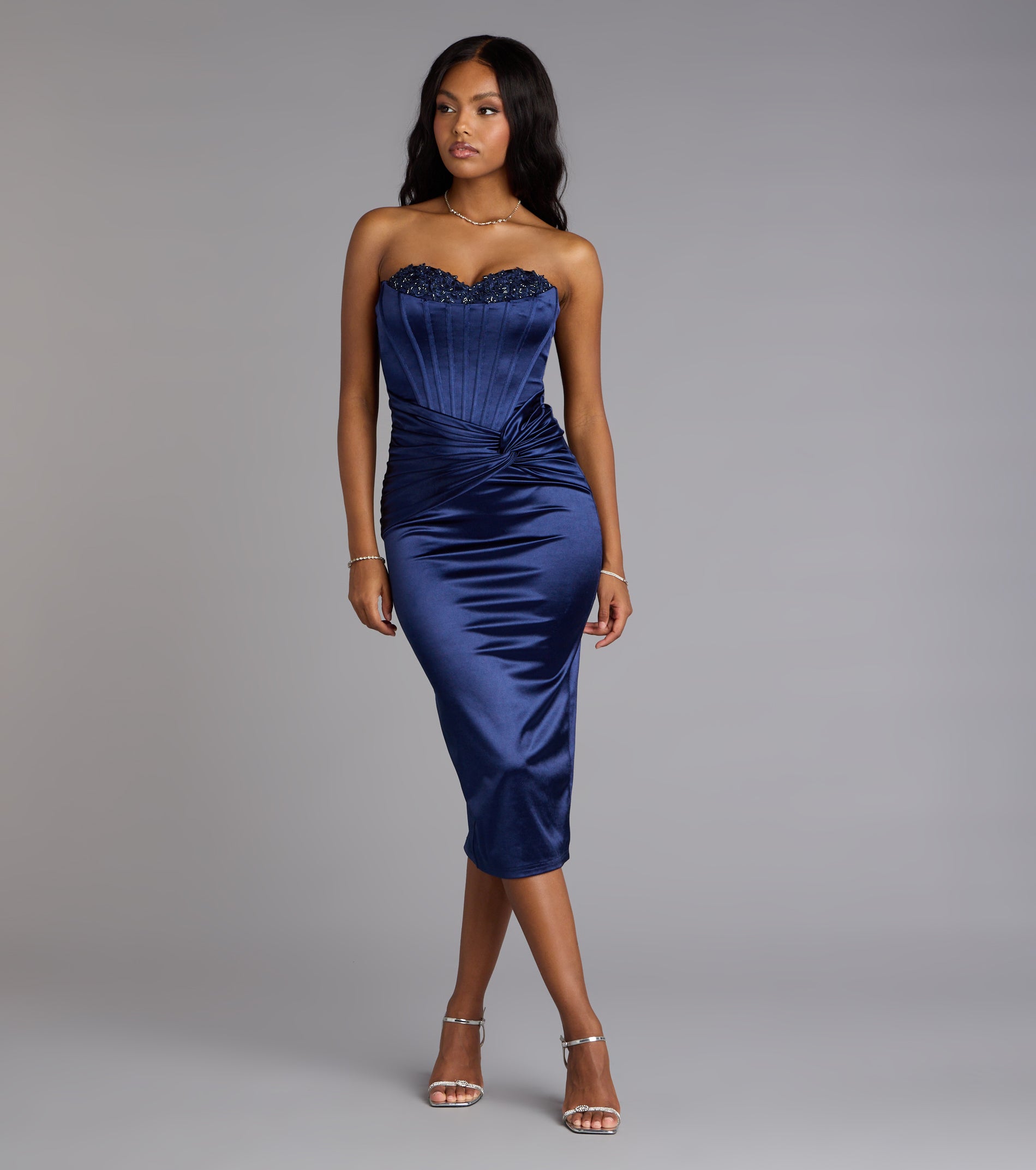 The Christy Satin Lace-Up Bustier Midi Formal Dress is your new go-to Windsor dress—effortless, versatile, and made to update your fall style in seconds.