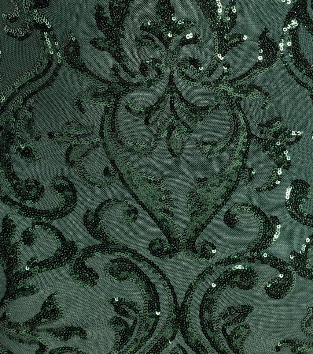 A stunning pick for an engagement photoshoot outfit or winter wedding guest dress, this fall formal dress showcases the Lilian Sequin Strapless Lace-Up Mini Dress in hunter green with a graceful silhouette that captures the moment.