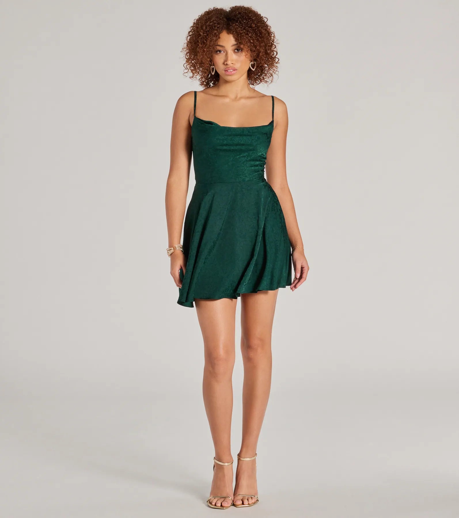 Make a bold statement in the Jianna Floral Satin Short A-Line Dress in hunter green, the perfect green dress for weddings, cocktail hours, nights out, and/or seasonal celebrations.