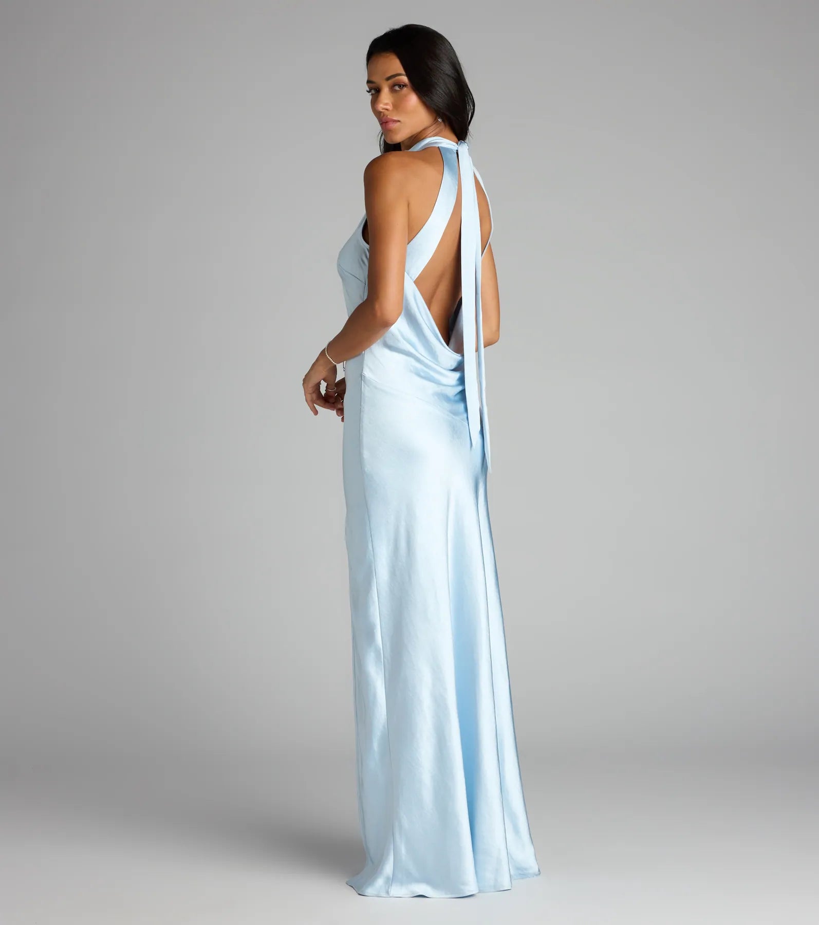 The Andie Halter Open Back Slit Satin Formal Dress is your new go-to light blue dress—effortless, versatile, and made to update your fall style in seconds.