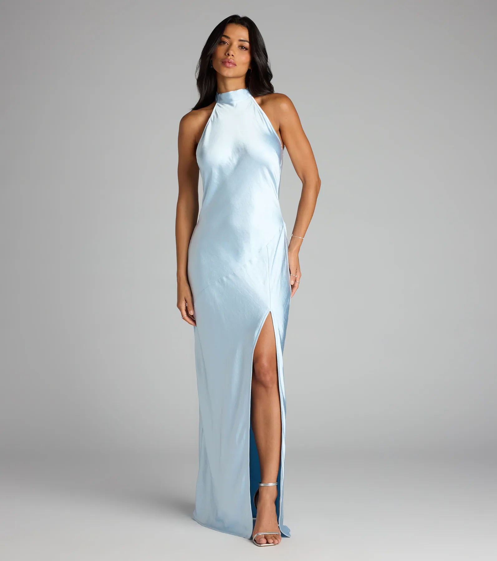 Style your seasonal looks with the Andie Halter Open Back Slit Satin Formal Dress, a trend-right, light blue fall dress designed for any plan on your calendar with new and unqiue details.