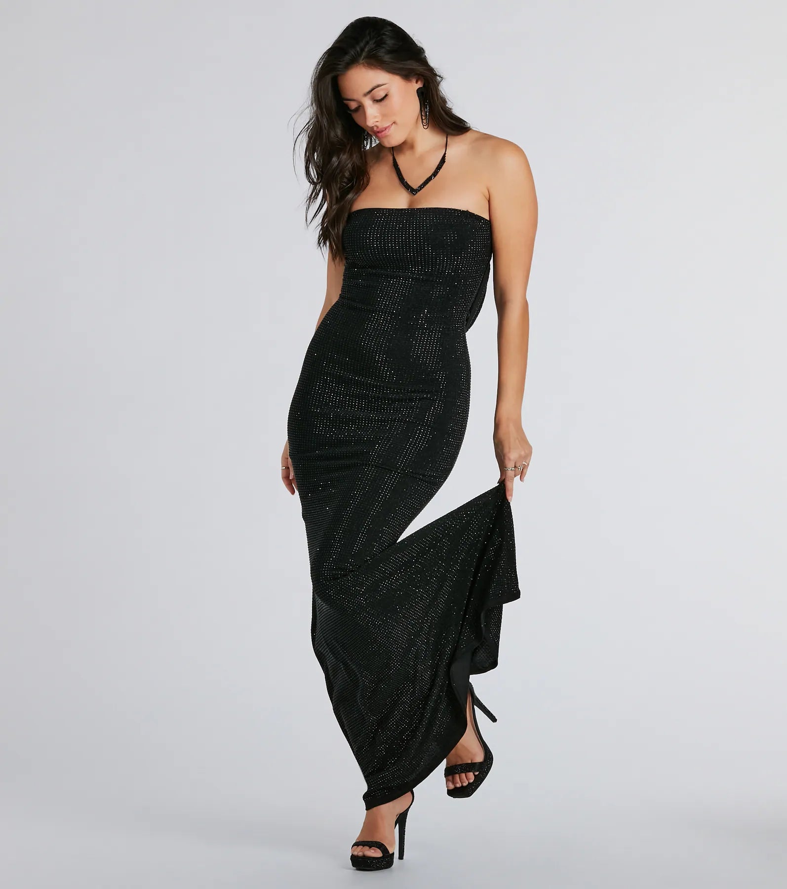 The Ana Formal Rhinestone Cowl Back Long Dress is your new go-to black dress—effortless, versatile, and made to update your fall style in seconds.