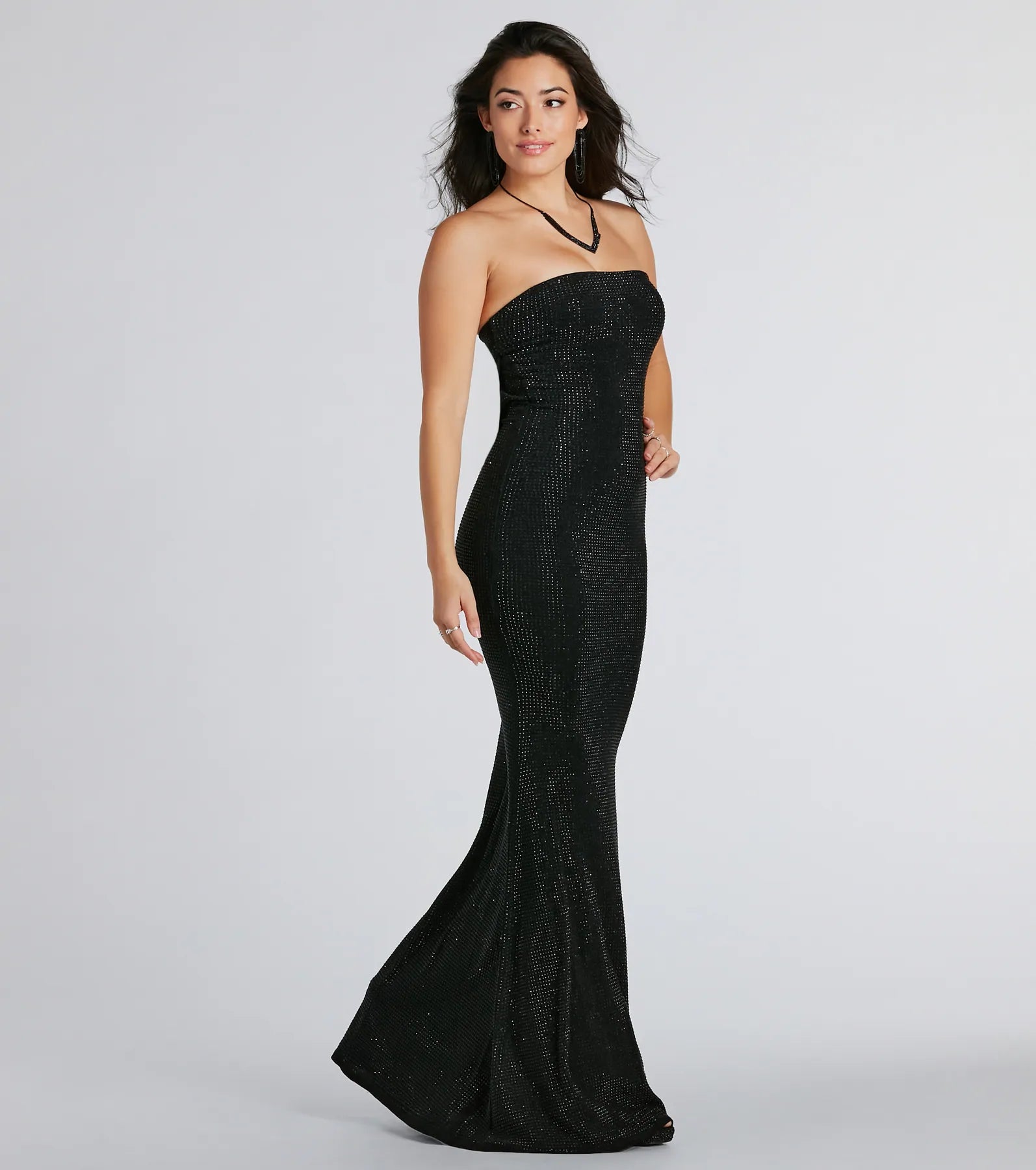 Celebrate in style with the Ana Formal Rhinestone Cowl Back Long Dress, a black holiday dresses standout that brings bold, festive flair and a party-ready look.