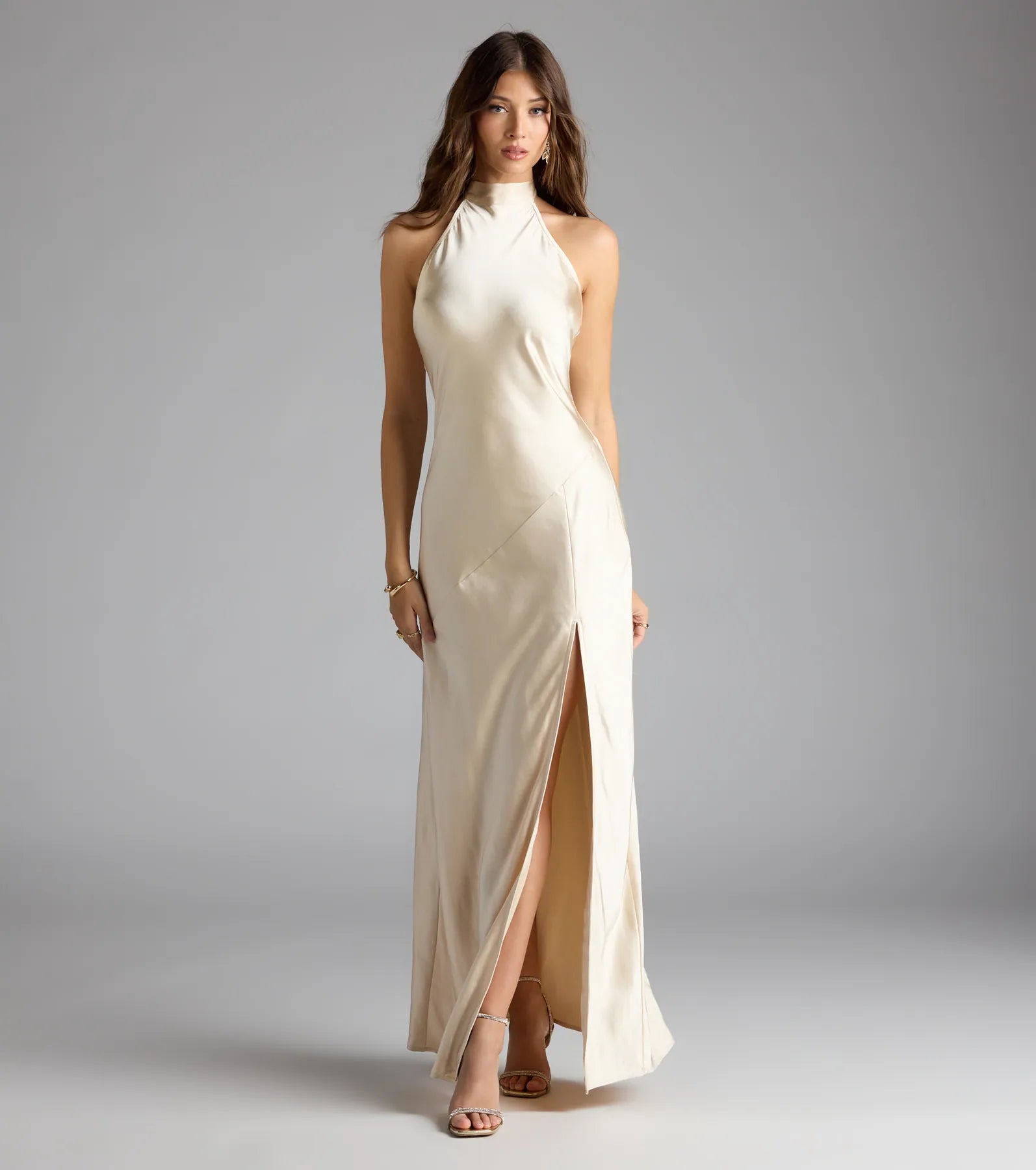 Feel instantly put-together in the Andie Halter Open Back Slit Satin Formal Dress in gold, a stylish wedding guest dress designed for confident style and all-out celebration.