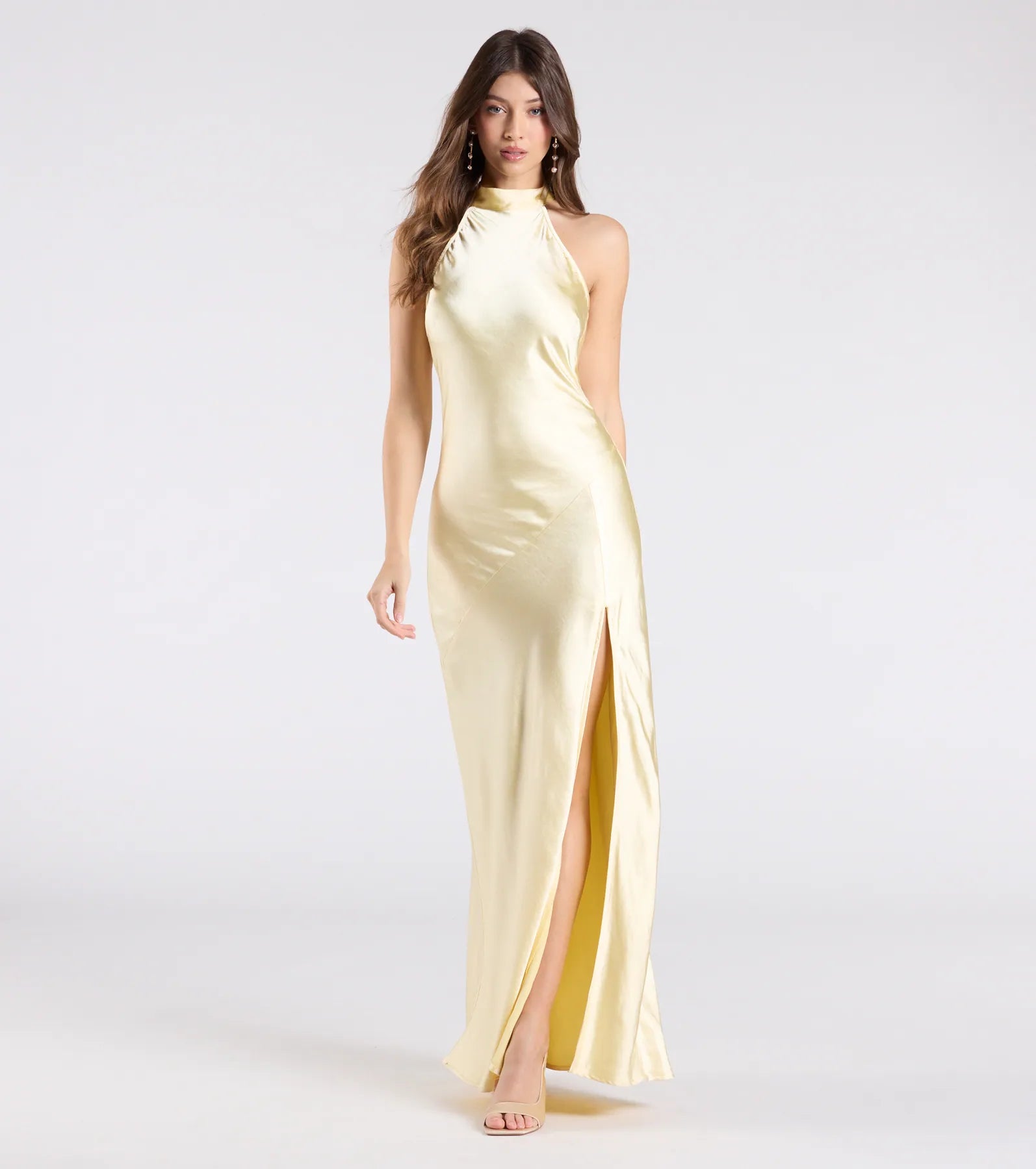 Feel instantly put-together in the Andie Halter Open Back Slit Satin Formal Dress in yellow, a stylish wedding guest dress designed for confident style and all-out celebration.