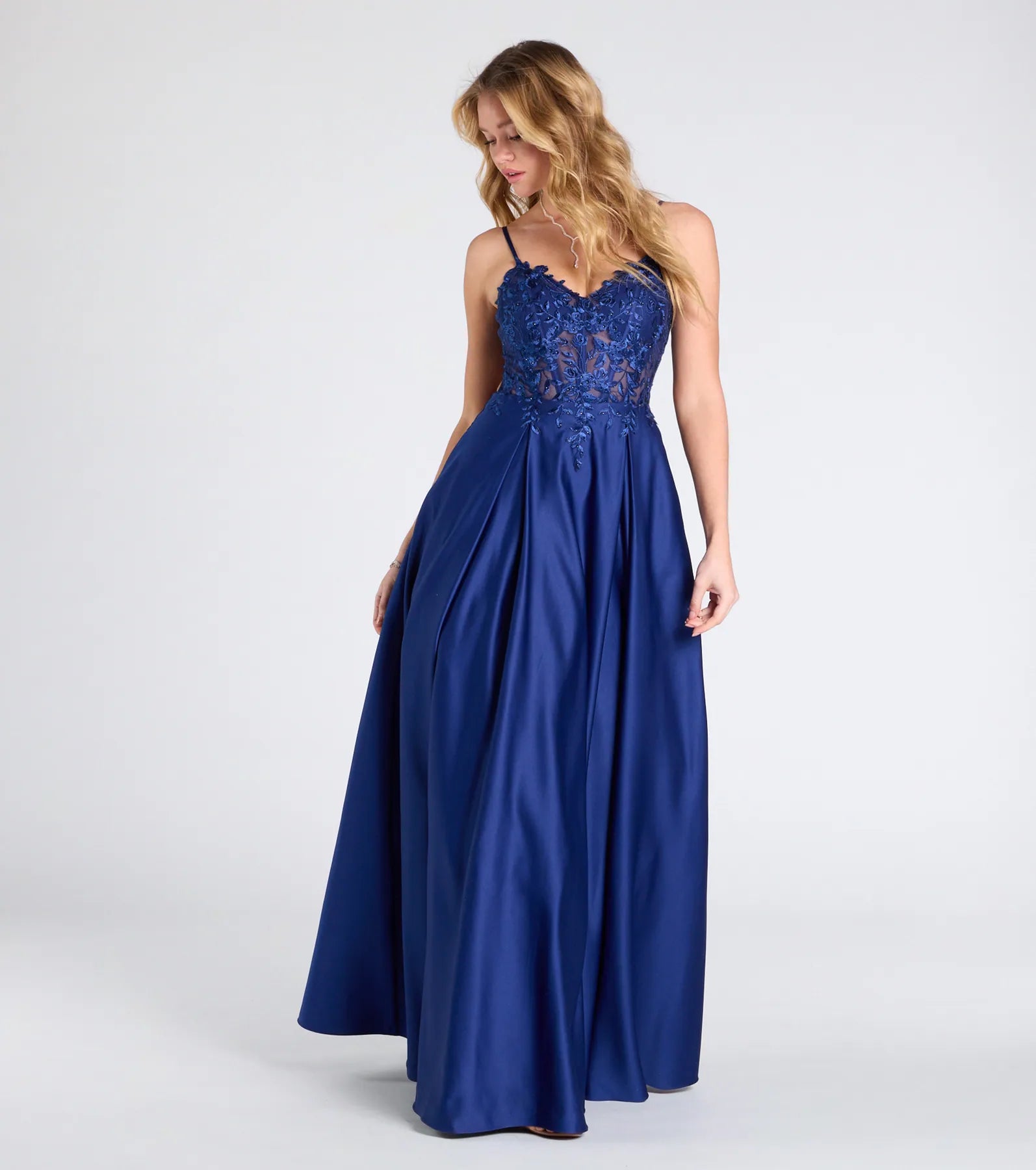 Own the spotlight in the Myra Lace-Up Floral Embroidered A-Line Ball Gown, a navy blue formal dress crafted to deliver luxe style for autumn weddings, Military Balls, or any special event.
