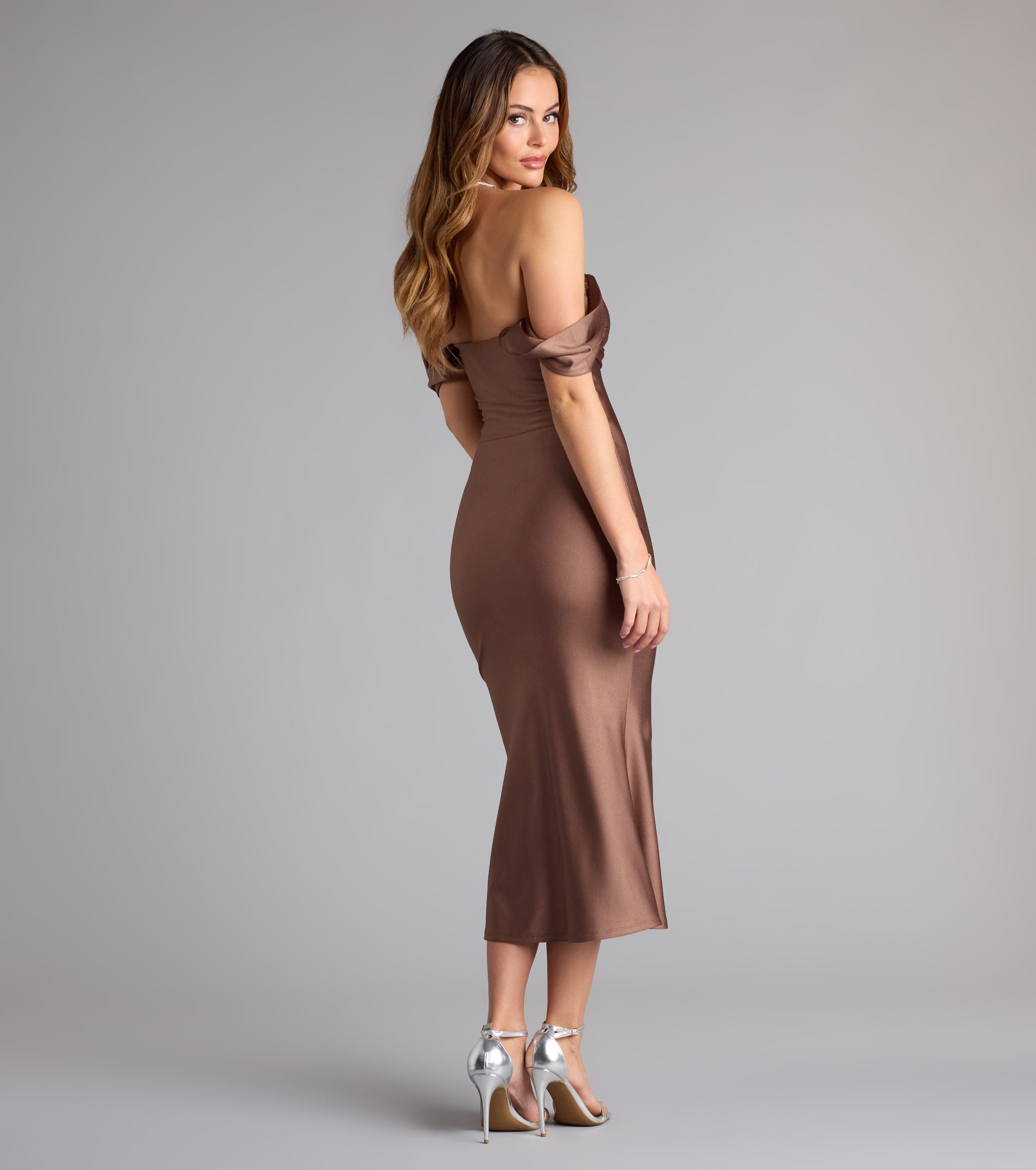Feel ready for every dance floor moment or feed-worthy reel in the Exceptional Off-The-Shoulder Flared Midi Dress, a homecoming dress designed to own your moment.