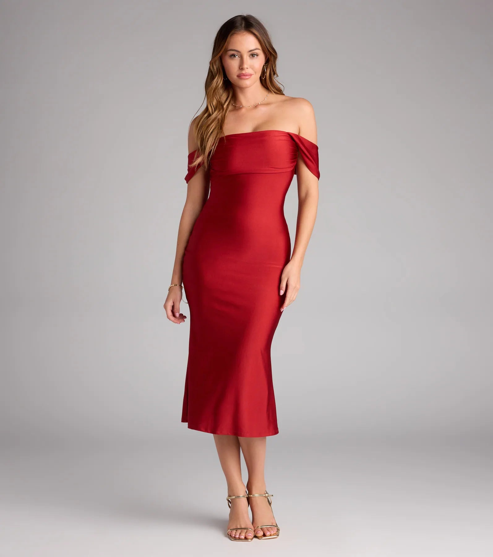 The Exceptional Off-The-Shoulder Flared Midi Dress is your new go-to rust dress—effortless, versatile, and made to update your fall style in seconds.