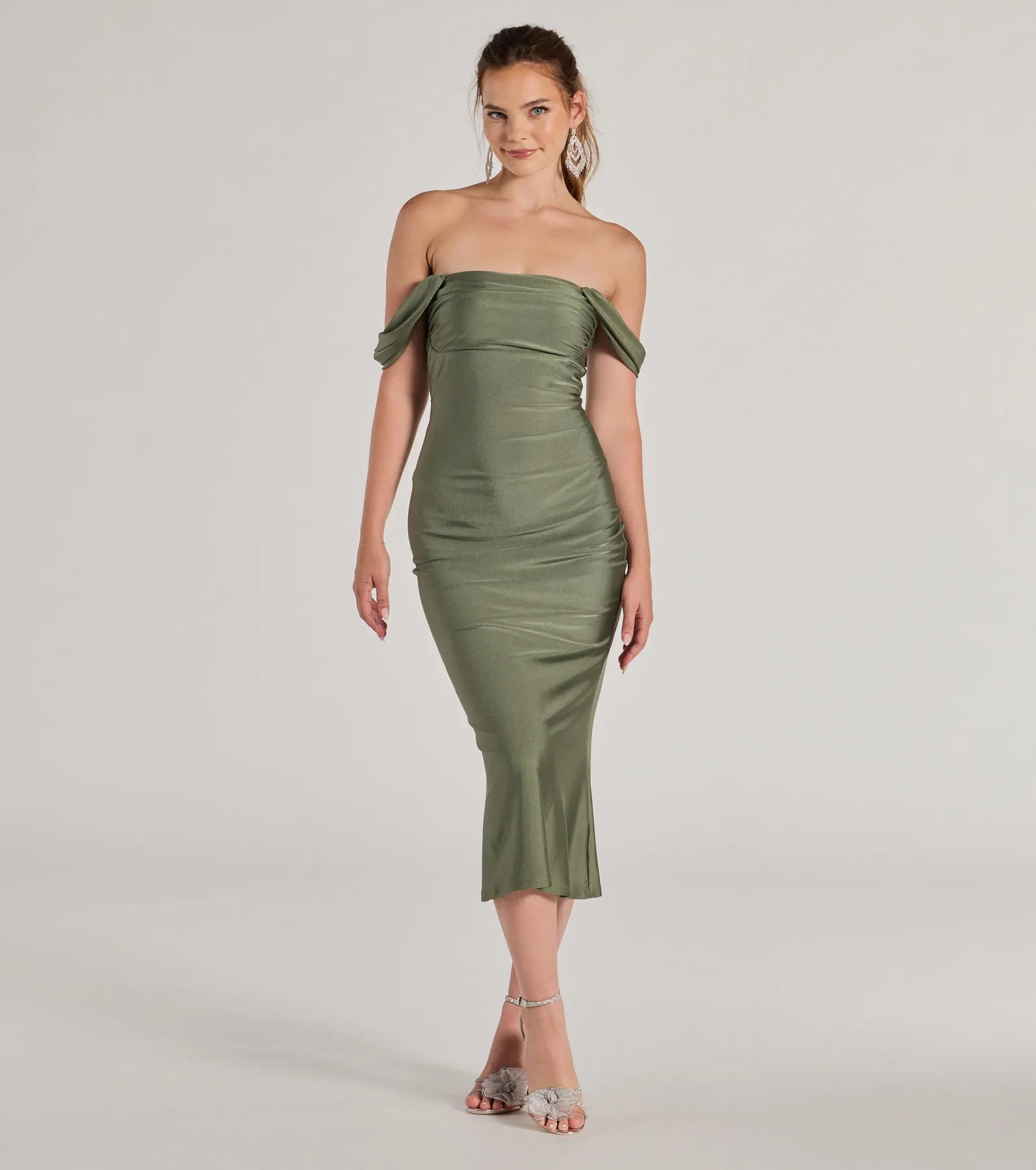 Make the big day unforgettable with the Exceptional Off-The-Shoulder Flared Midi Dress, a gorgeous sage green bridesmaid dress that balances elegance and affordability.