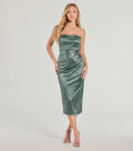 With its mid-calf hem and popular flattering fit, the Luxe Dream Strapless Satin Midi Dress in sage green nails the balance of trend and ease, redefining go-to midi dresses for any occasion.