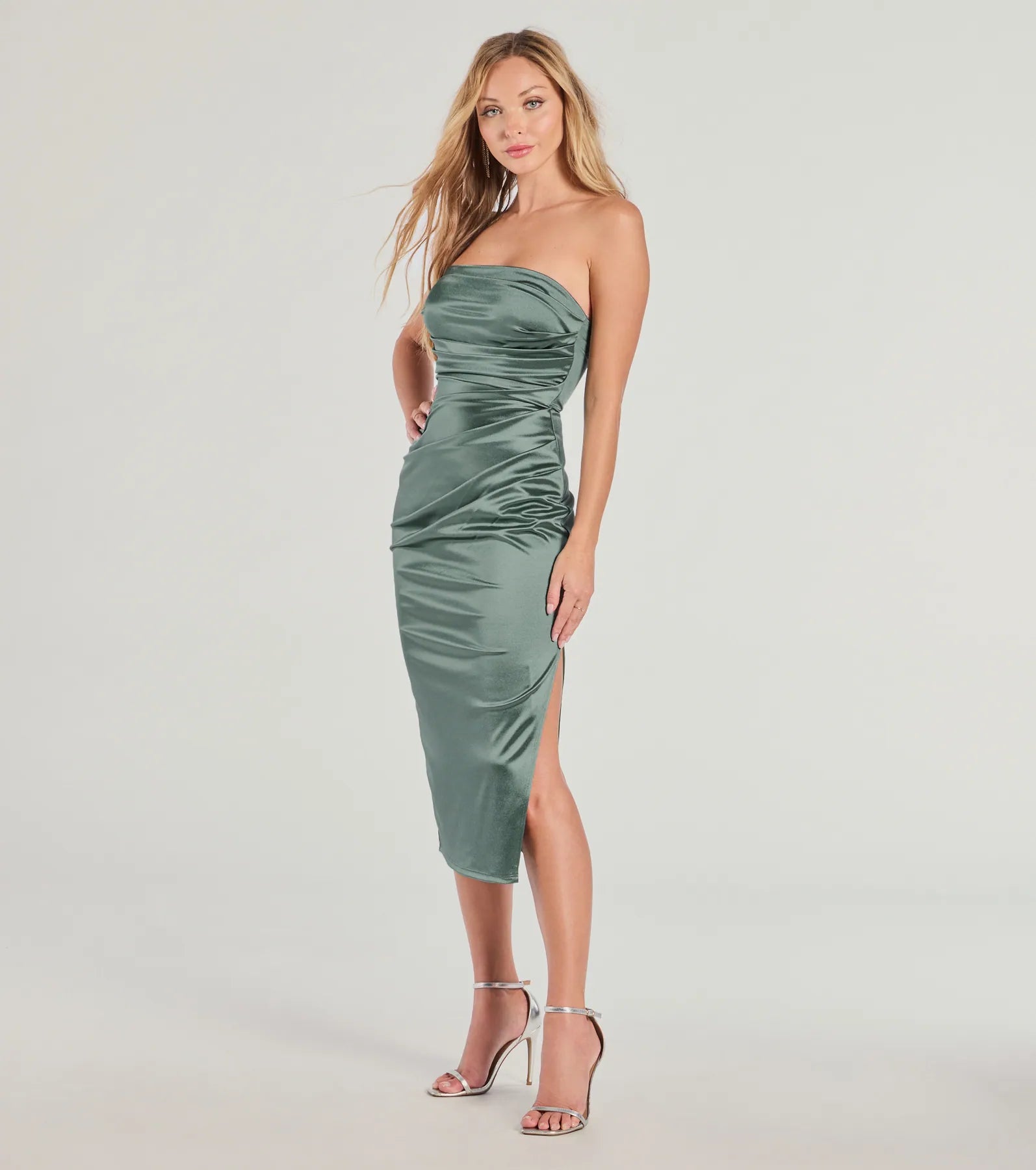 The Luxe Dream Strapless Satin Midi Dress in sage green features a flattering fit and mid-calf hem, redefining effortless midi dresses for any occasion.