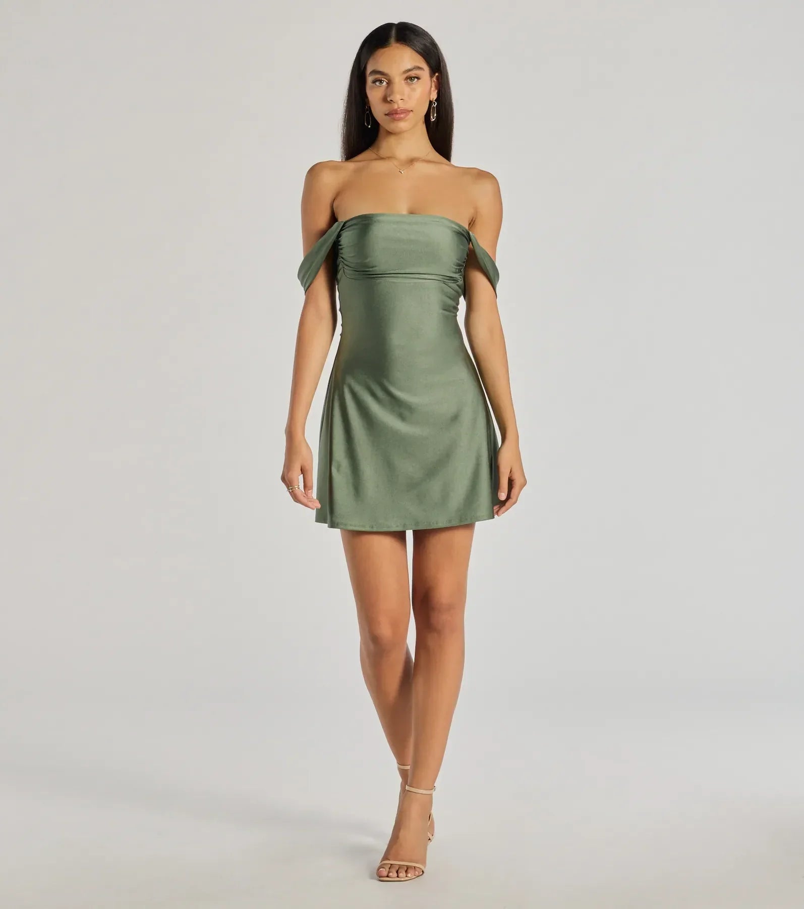 Make a bold statement in the Classics Lover Off-The-Shoulder Satin A-Line Mini Dress in sage green, the perfect green dress for weddings, cocktail hours, nights out, and/or seasonal celebrations.