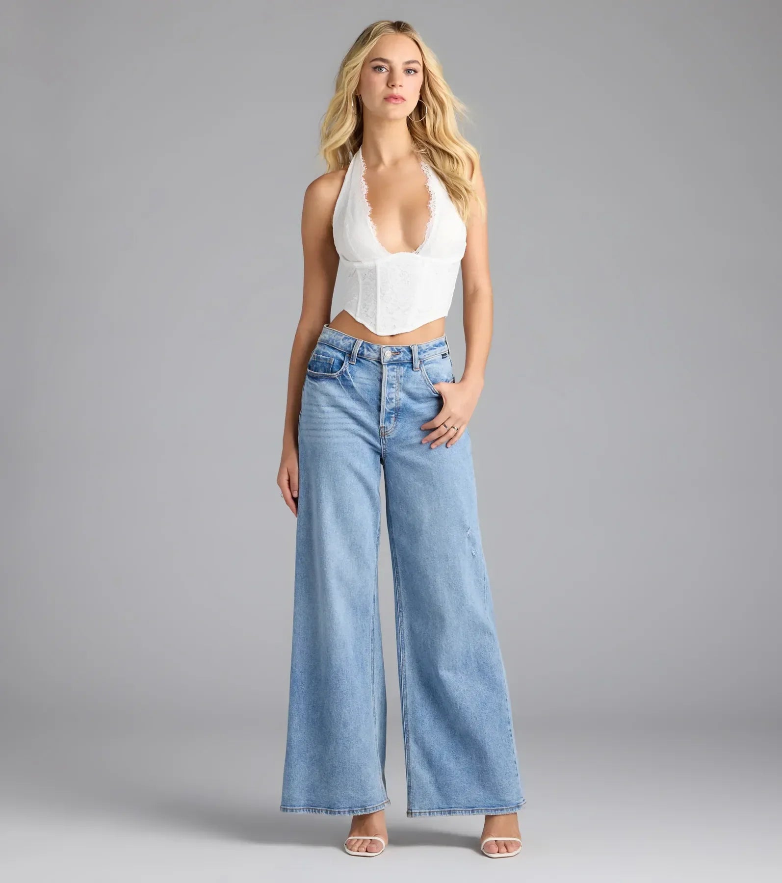 Add a seasonal refresh to your look with the Gorgeous Night Lace Trim Corset Halter Top, a trendy top in ivory made for easy styling for any vibe.