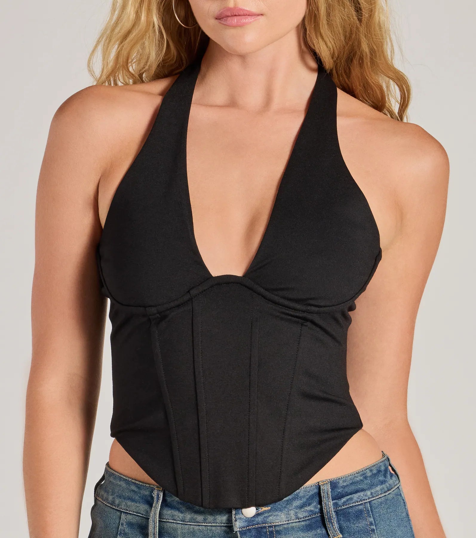 From bold to effortless, the Sleek And Stunning Corset Halter Top lets you define your vibe with black tops that speak your style.