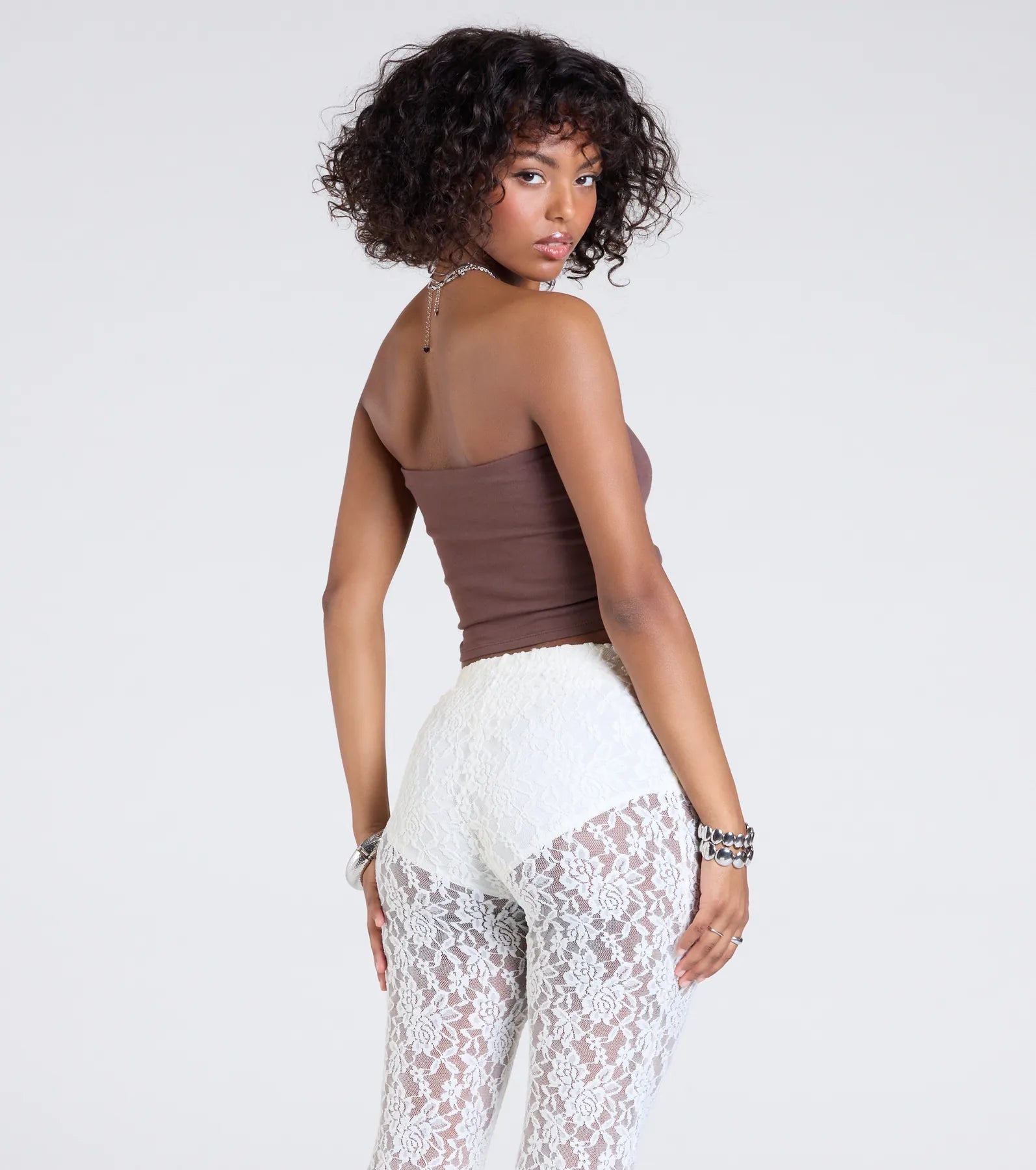 From bold to effortless, the Cowgirls Break Hearts Graphic Crop Top lets you define your vibe with brown tops that speak your style.