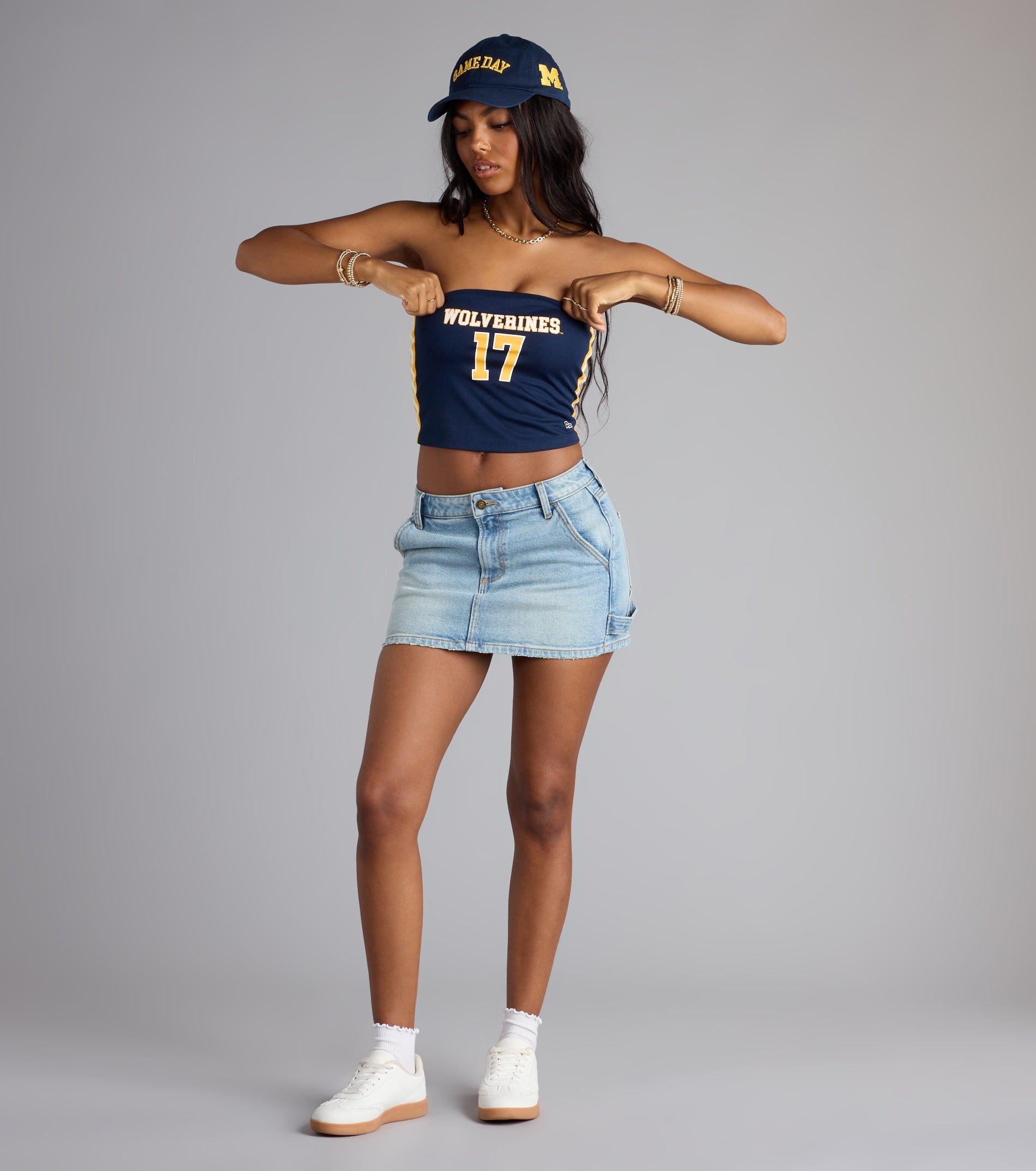 Trendy women’s tops, like the Game On Wolverines™ Jersey Tube Top, bring effortless style for fall layering, lounging, or going out.