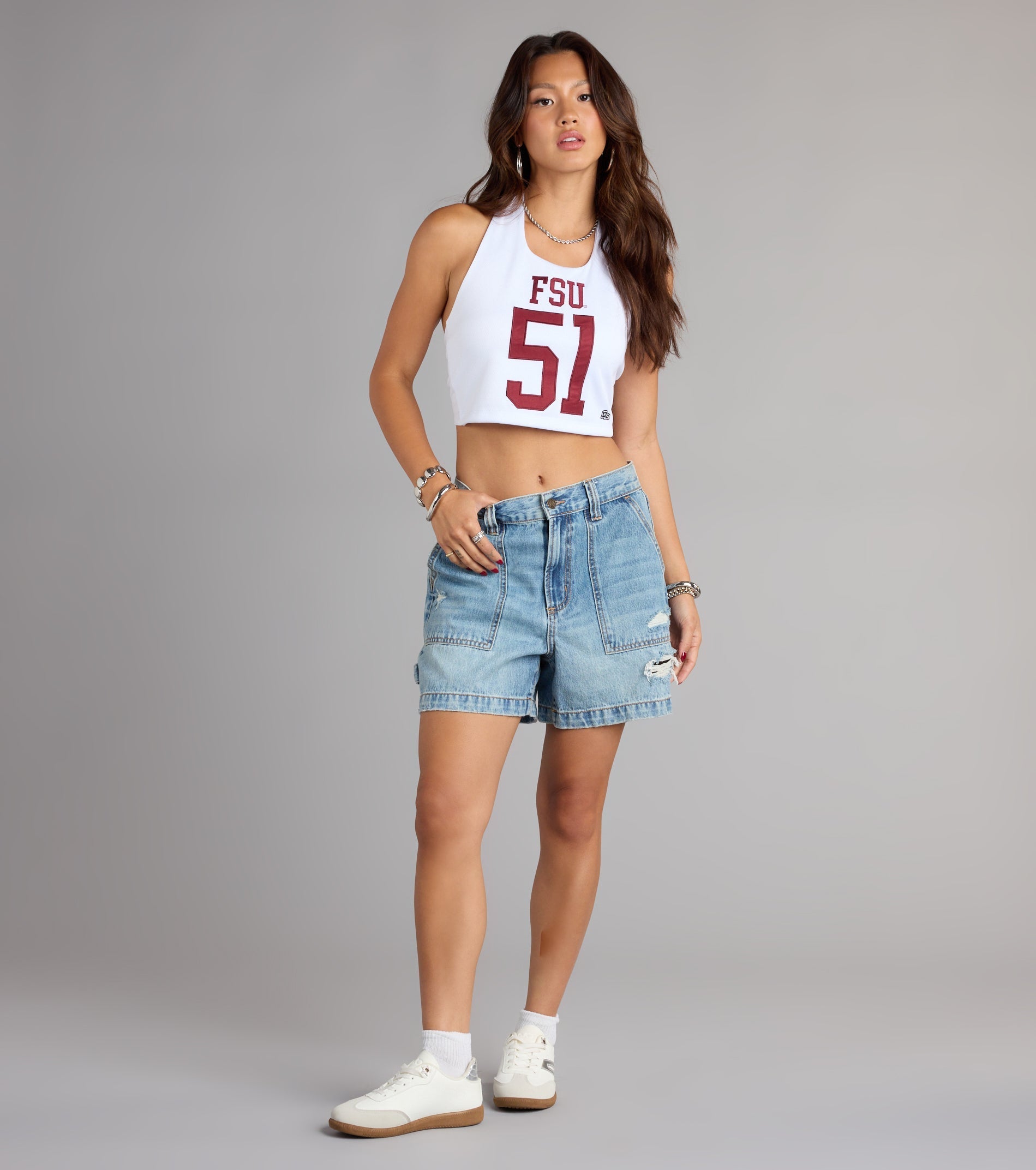 Trendy women’s tops, like the Flirty Style Florida State® Jersey Halter Top, bring effortless style for fall layering, lounging, or going out.