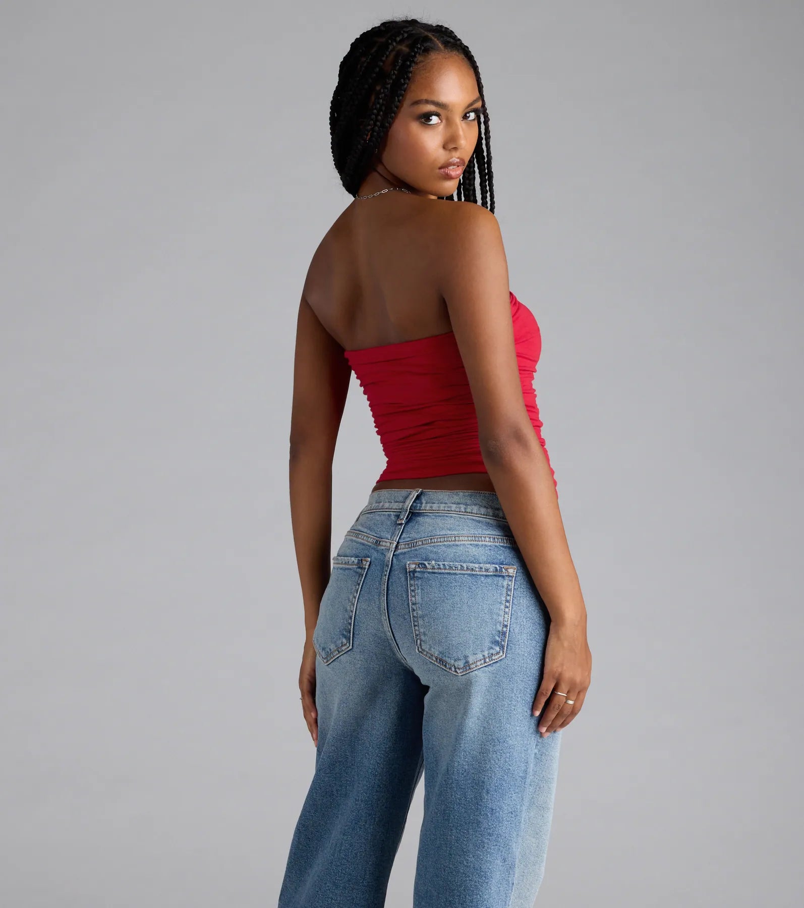 Trendy women’s tops, like the Cutest Vibe Ruched Knit Tube Top, bring effortless style for fall layering, lounging, or going out.