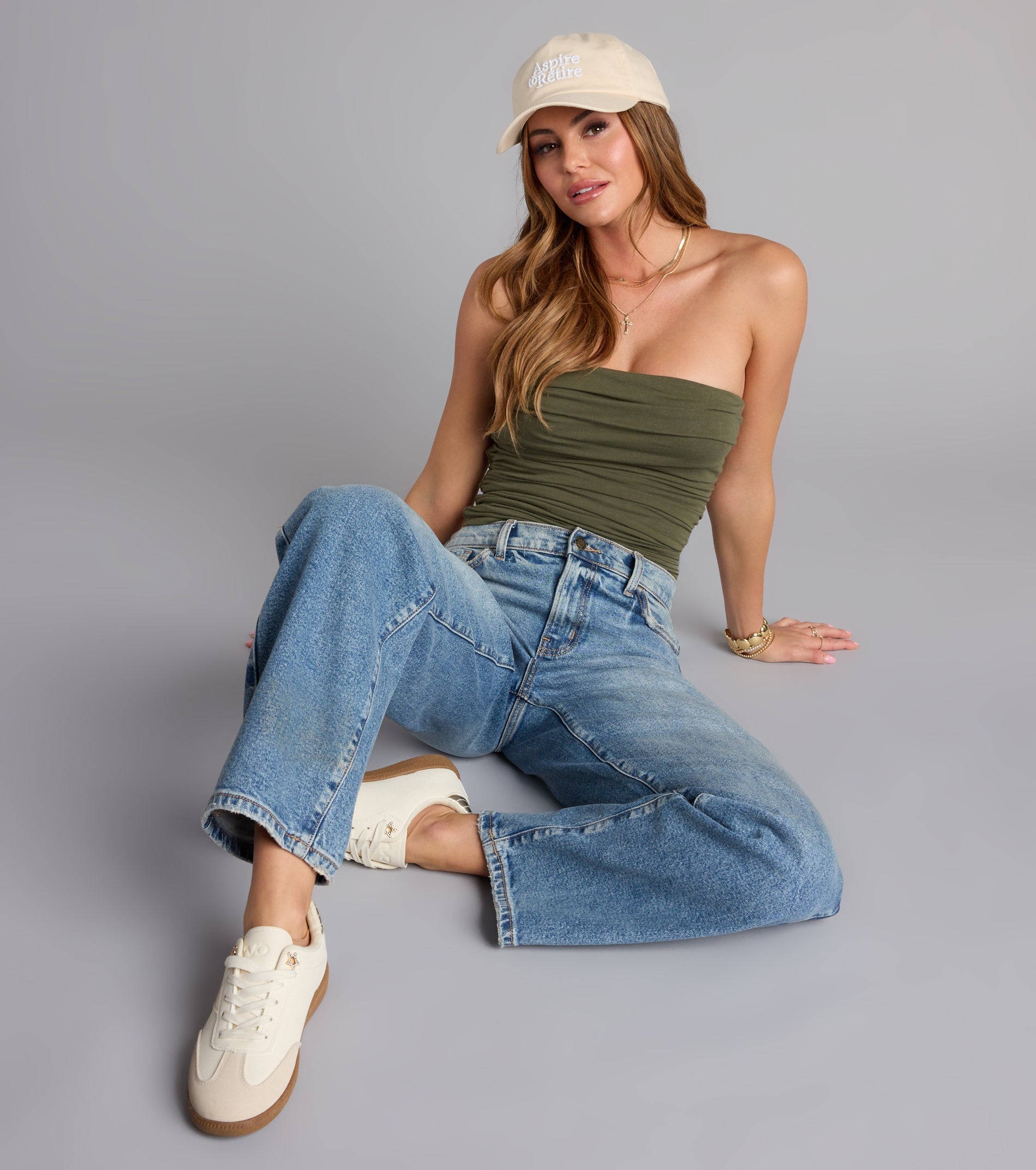 Trendy women’s tops, like the Cutest Vibe Ruched Knit Tube Top, bring effortless style for fall layering, lounging, or going out.