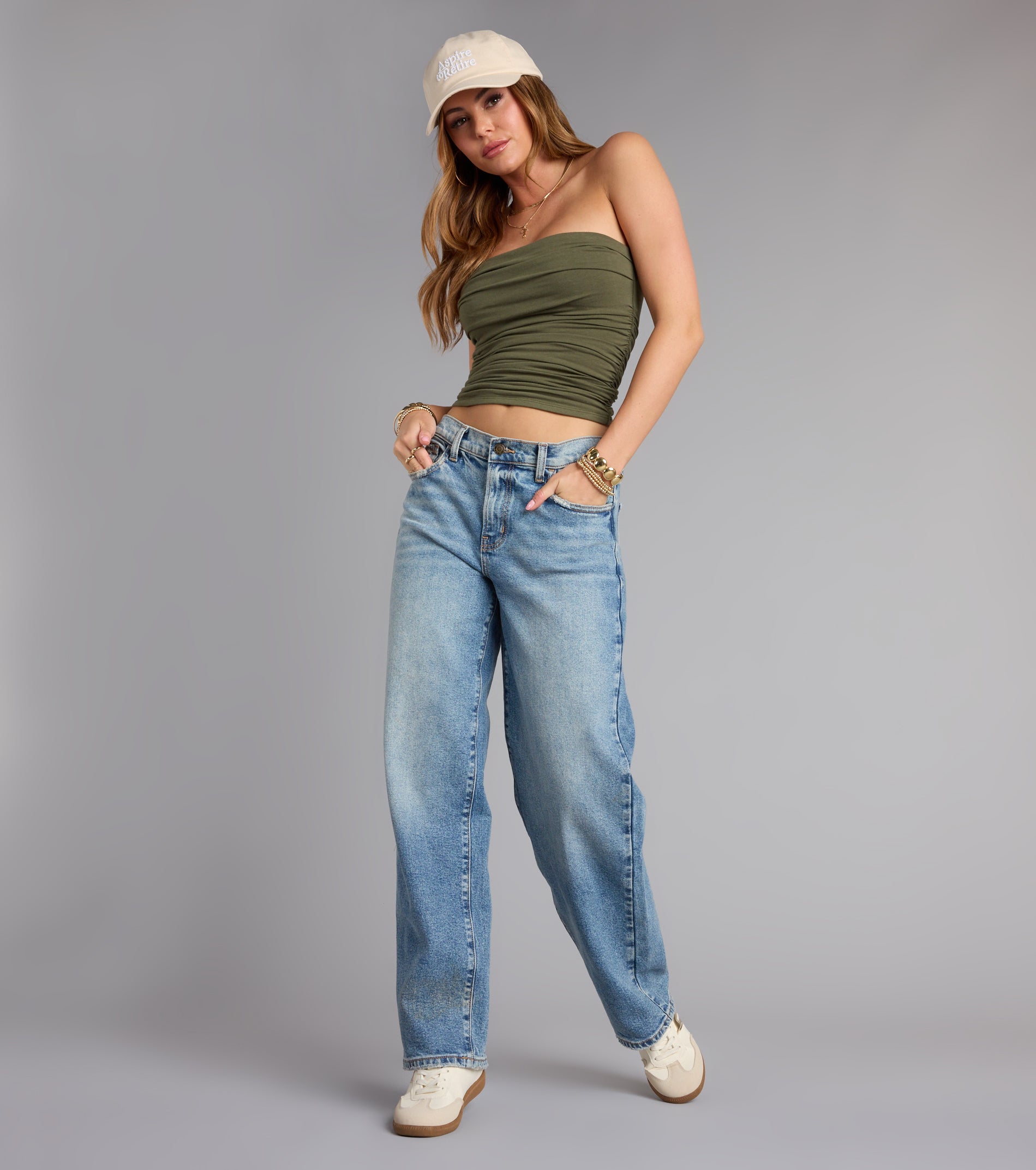 Trendy women’s tops, like the Cutest Vibe Ruched Knit Tube Top, bring effortless style for fall layering, lounging, or going out.