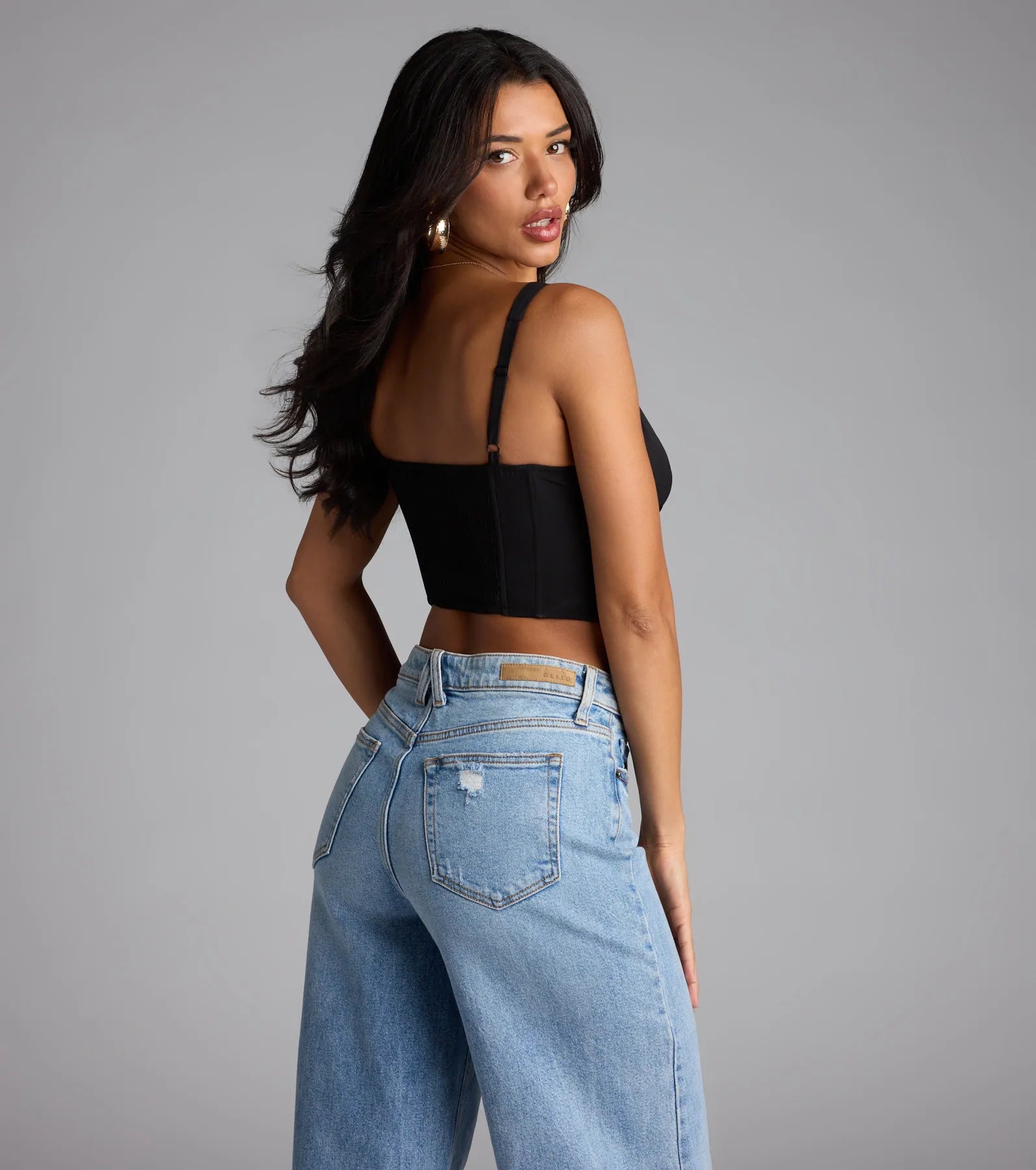 Complete your look with the On Repeat V-Neck Corset Top, a trendy black top that’s ready to pair with anything in your fall rotation.