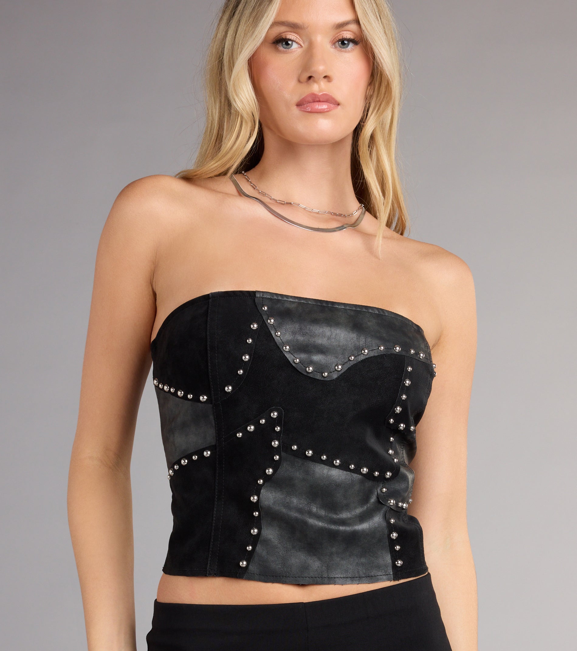 Trendy women’s tops, like the Rockstar Vibes Studded Faux Leather Tube Top, bring effortless style for fall layering, lounging, or going out.