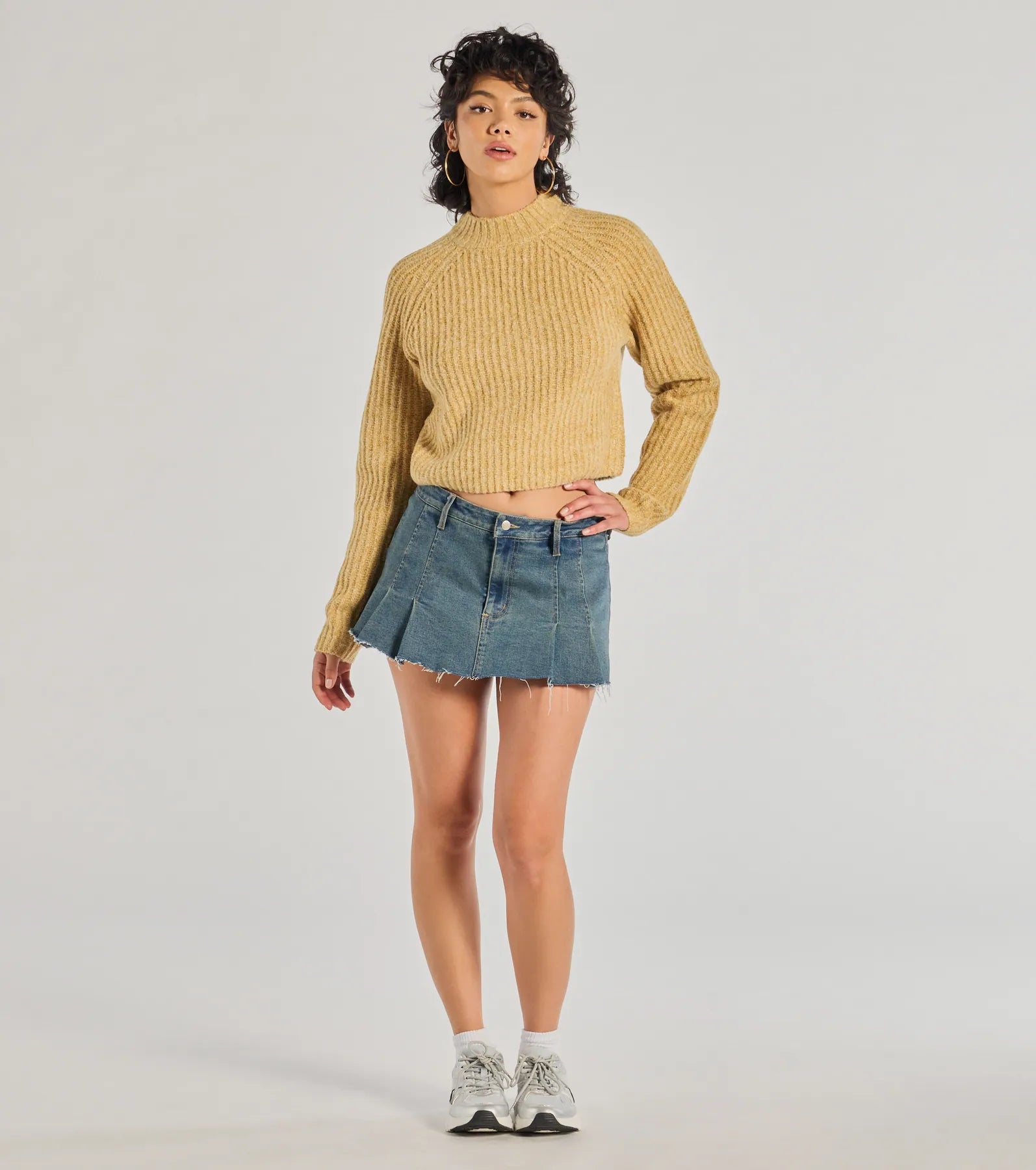 Add a sleek touch to your outfit with this mustard yellow long sleeve top—the Stylishly Casual Mock Neck Knit Sweater makes effortless transitions from desk to dinner.
