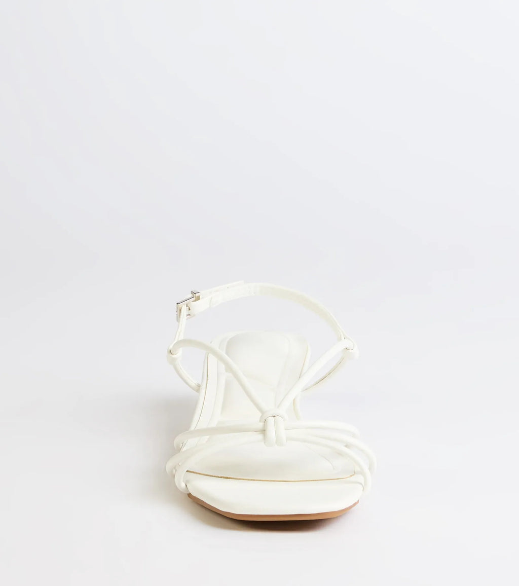 Style made simple with the Tied Together Strappy Kitten Heels in white, trendy women’s shoes that take your outfit from basic to bold in one step.