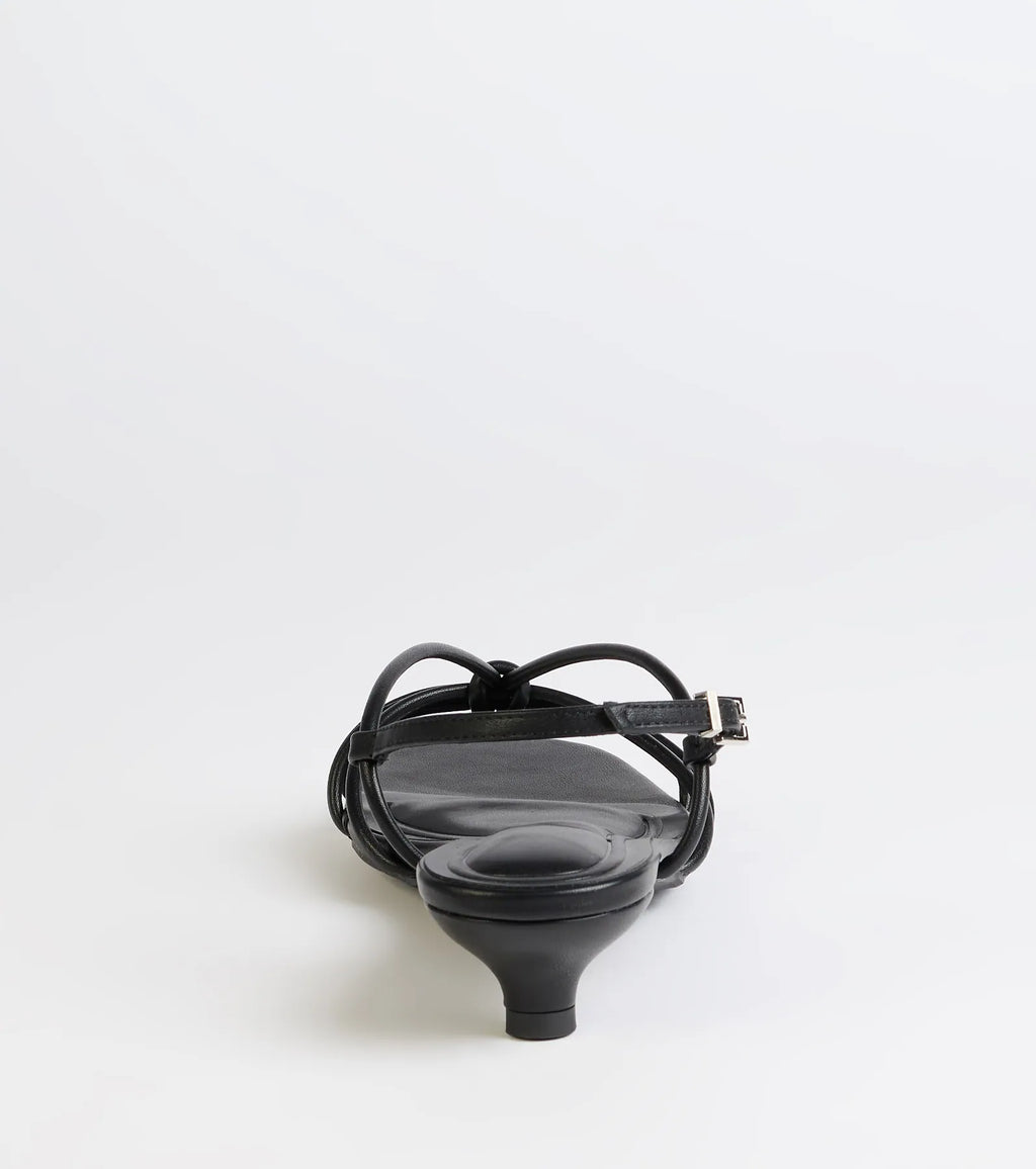 Turn heads in the Tied Together Strappy Kitten Heels, black heels showcasing a fresh trend or stylish detail made to elevate your full Windsor fit.