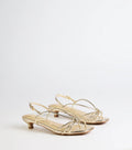 Style made simple with the Tied Together Strappy Kitten Heels in gold, trendy women’s shoes that take your outfit from basic to bold in one step.