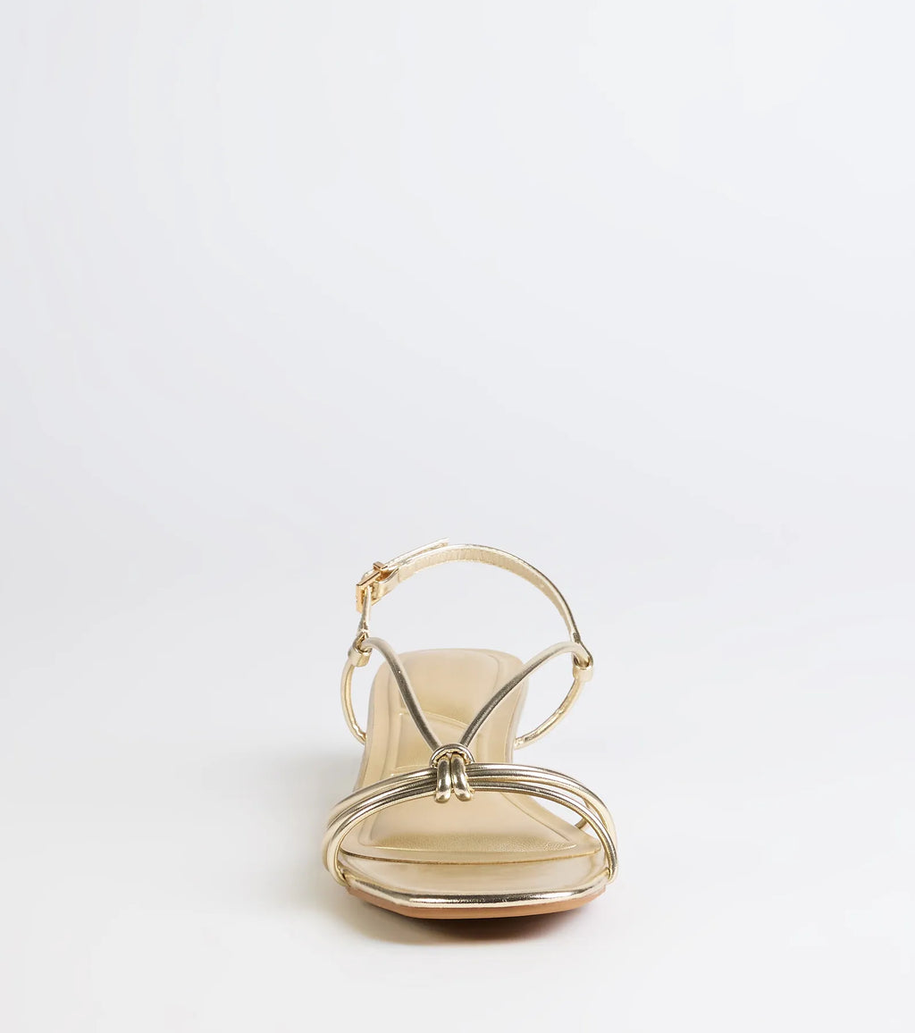 Style made simple with the Tied Together Strappy Kitten Heels in gold, trendy women’s shoes that take your outfit from basic to bold in one step.