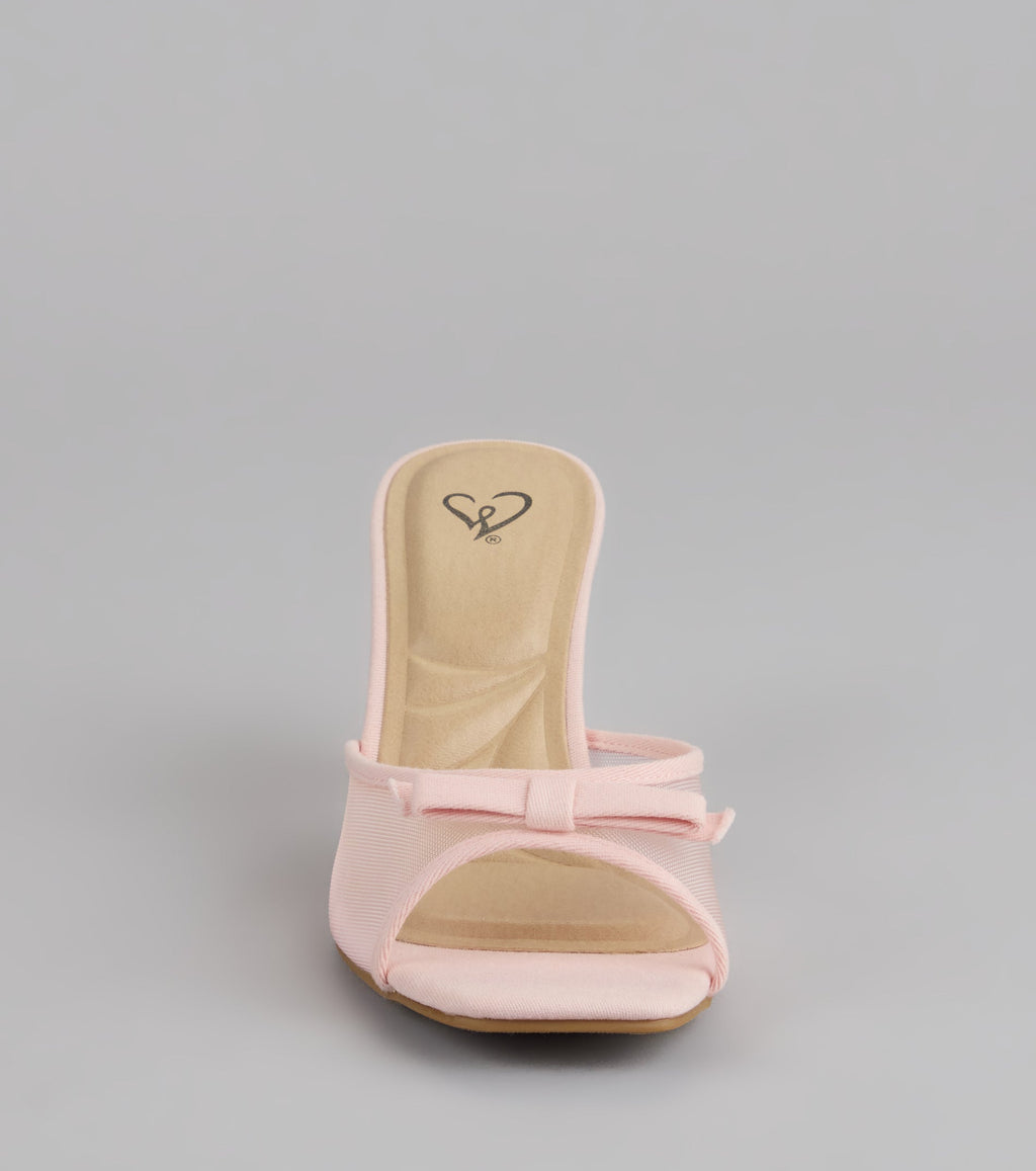 Style made simple with the Dainty Drama Mesh Bow Kitten Mules, trendy women’s shoes that take your outfit from basic to bold in one step.