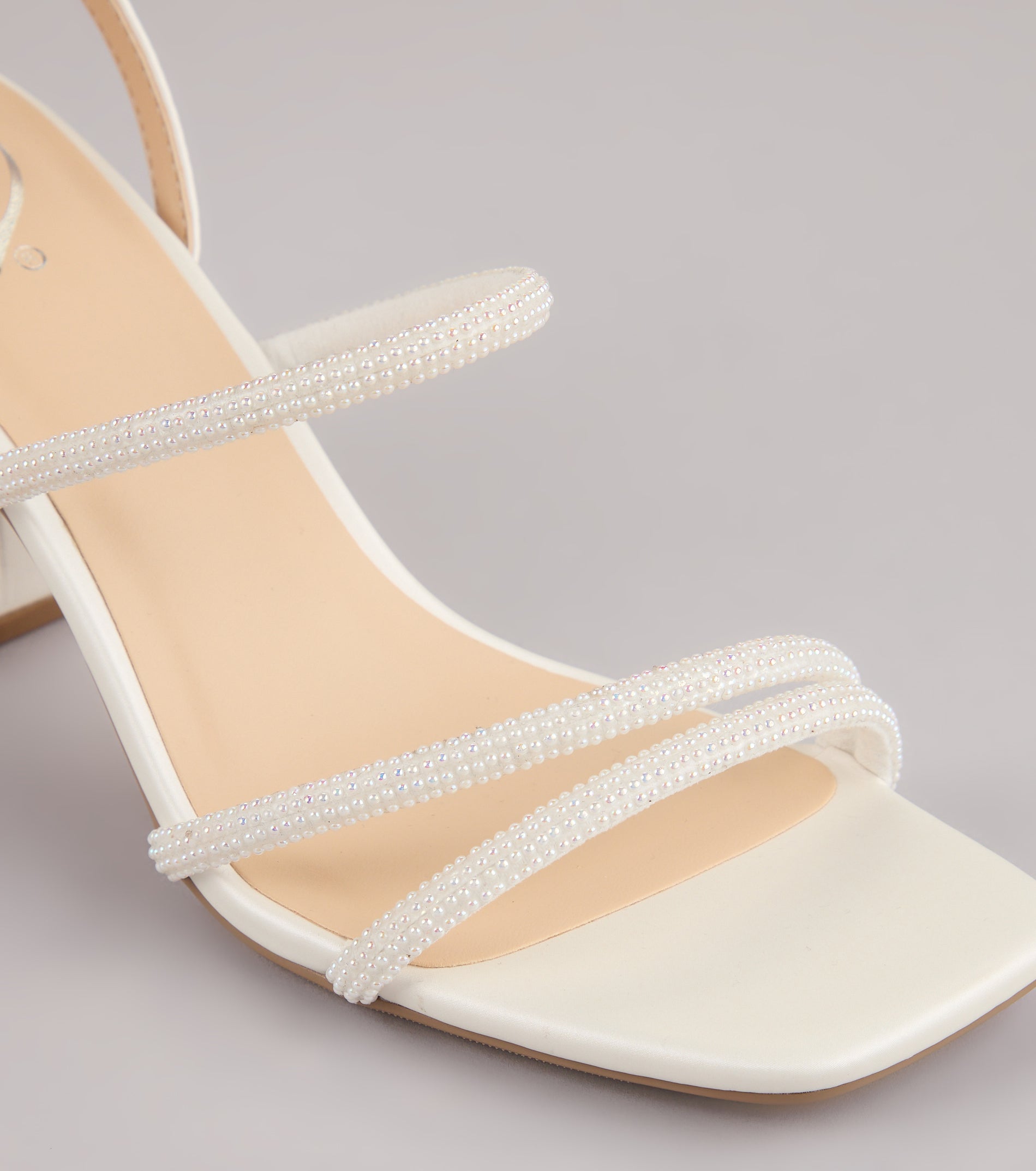 Style made simple with the Chic And Polished Pearl Satin Block Heels, trendy women’s shoes that take your outfit from basic to bold in one step.