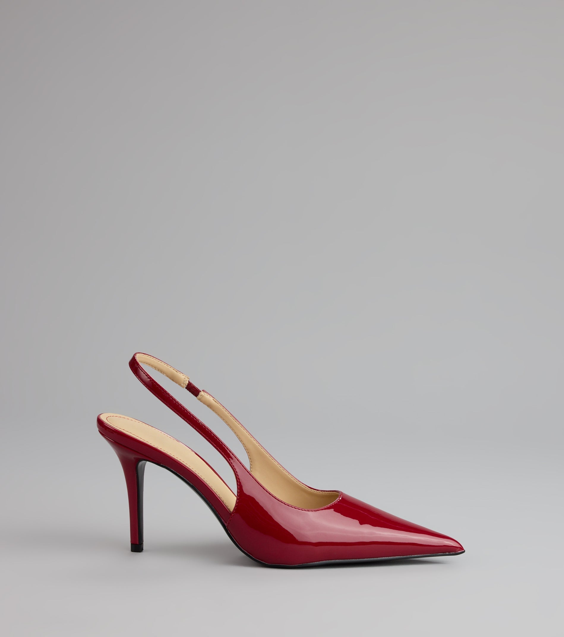 Style made simple with the Sharp Finish Patent Slingback Pumps, trendy women’s shoes that take your outfit from basic to bold in one step.