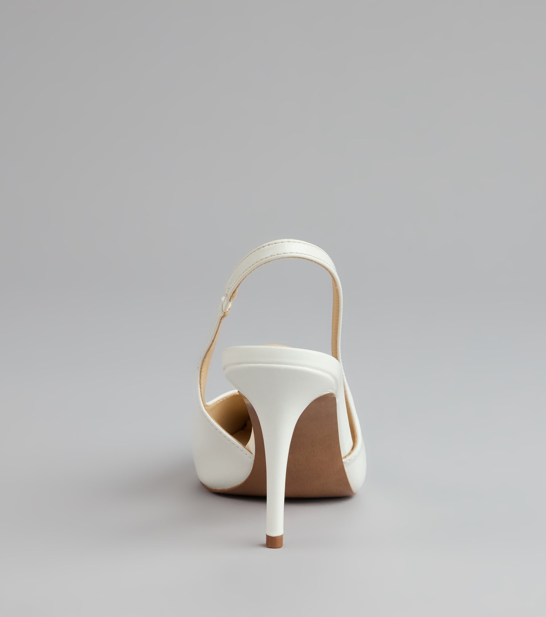 Style made simple with the Sharp Finish Patent Slingback Pumps, trendy women’s shoes that take your outfit from basic to bold in one step.