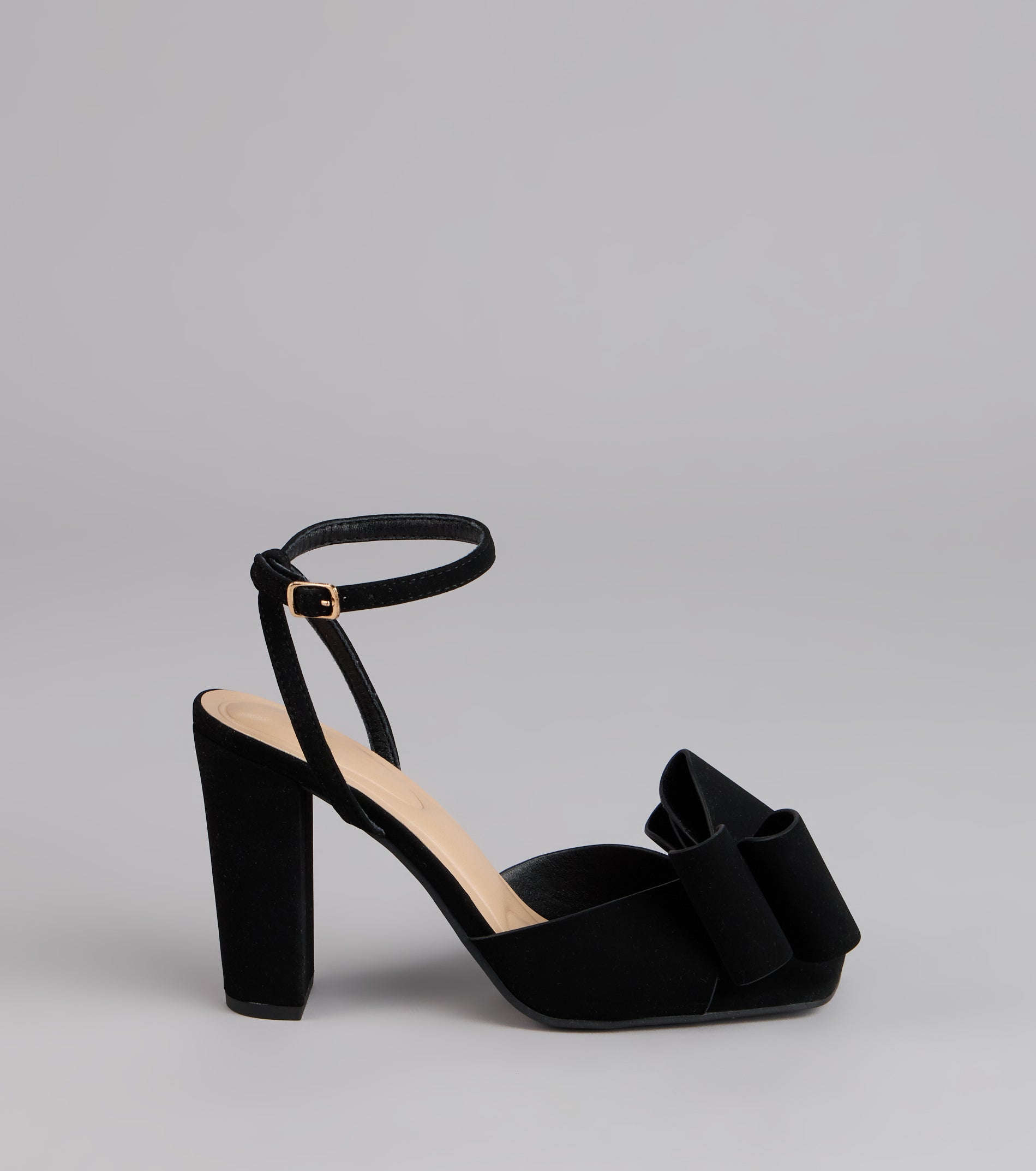 Style made simple with the Make A Statement Bow Block Heels, trendy women’s shoes that take your outfit from basic to bold in one step.