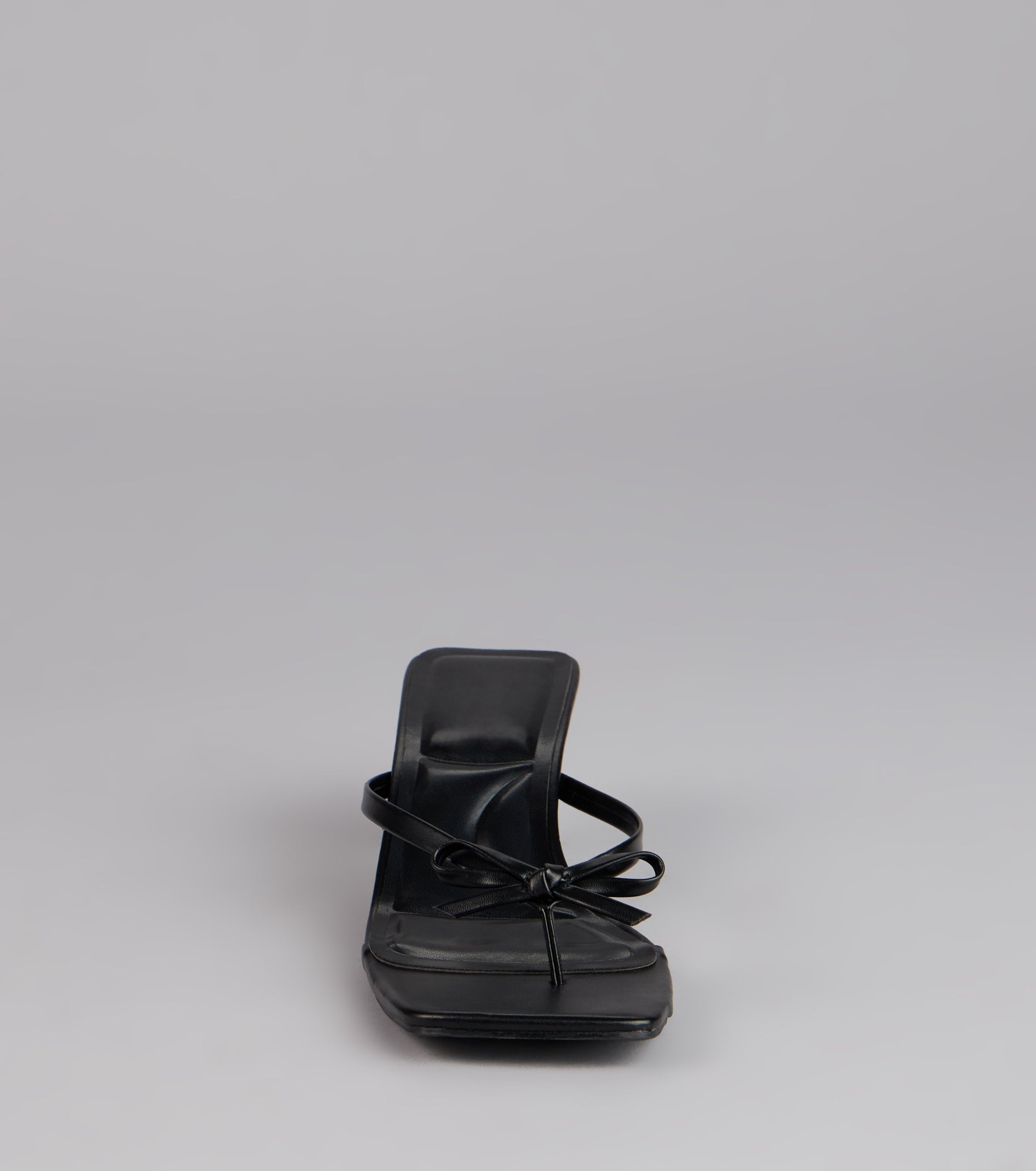 Style made simple with the Play Nice Bow Thong Heels, trendy women’s shoes that take your outfit from basic to bold in one step.