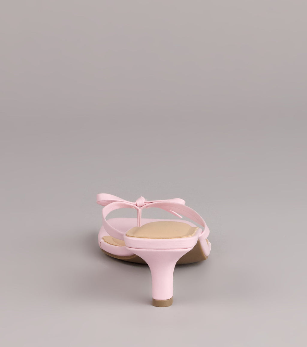 Style made simple with the Play Nice Bow Thong Heels, trendy women’s shoes that take your outfit from basic to bold in one step.