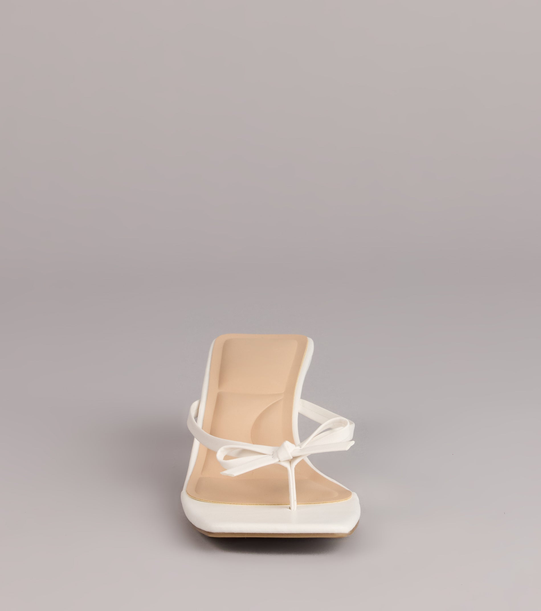 Style made simple with the Play Nice Bow Thong Heels, trendy women’s shoes that take your outfit from basic to bold in one step.