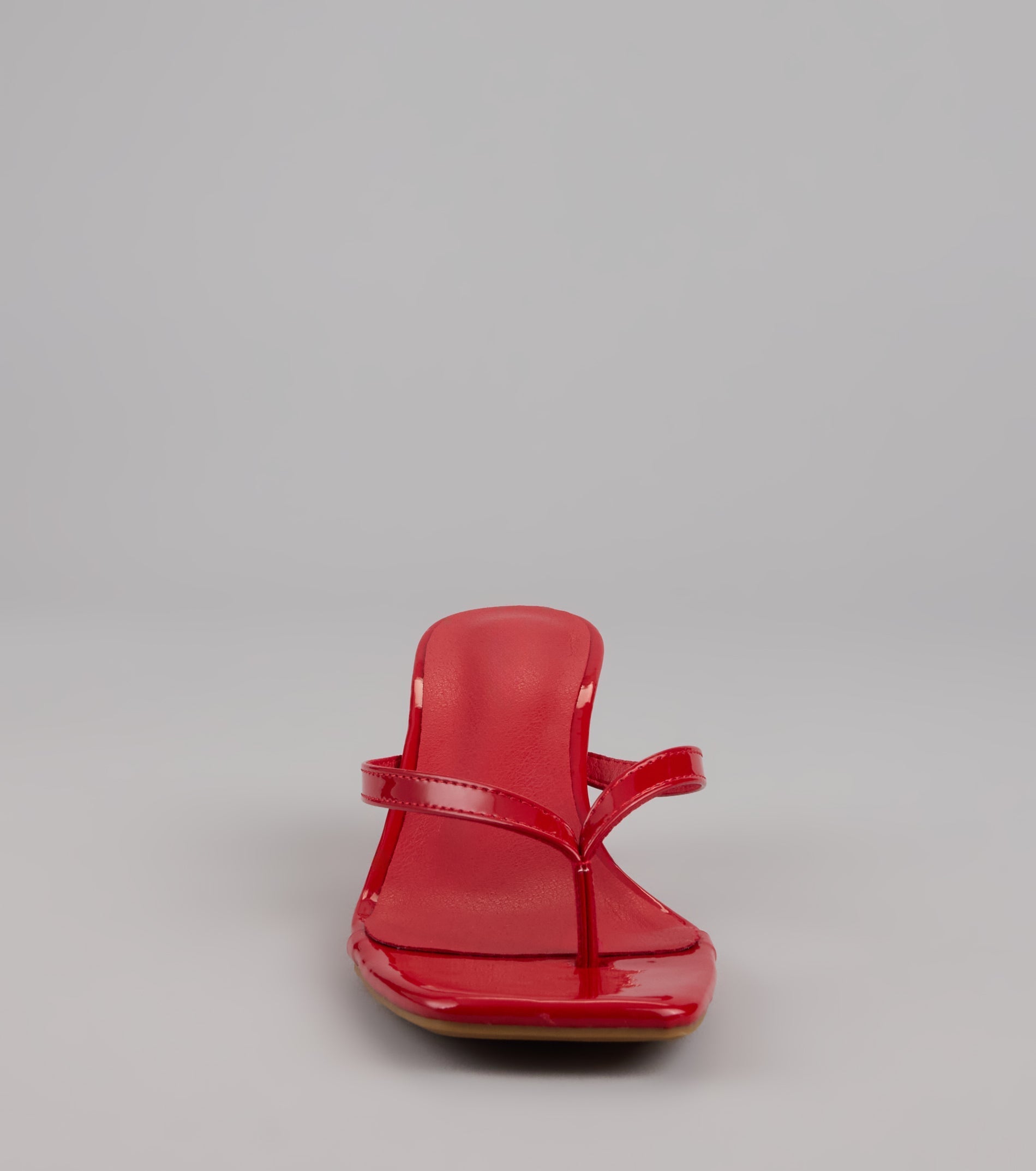 This piece brings trend-right energy to the Sleek Obsessions Patent Thong Kitten Heels, perfect for fall outfits that stand out.