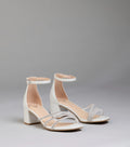 Style made simple with the Ultra Luxe Rhinestone Short Block Heels in pearl, trendy women’s shoes that take your outfit from basic to bold in one step.